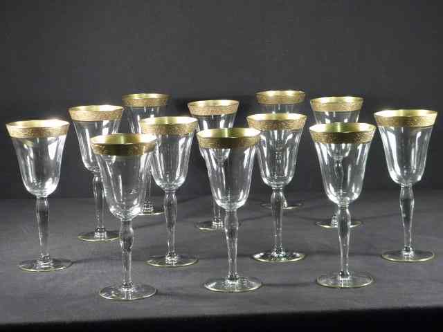 Appraisal: Twelve gold banded or gold rimmed glass wine stems Glasses