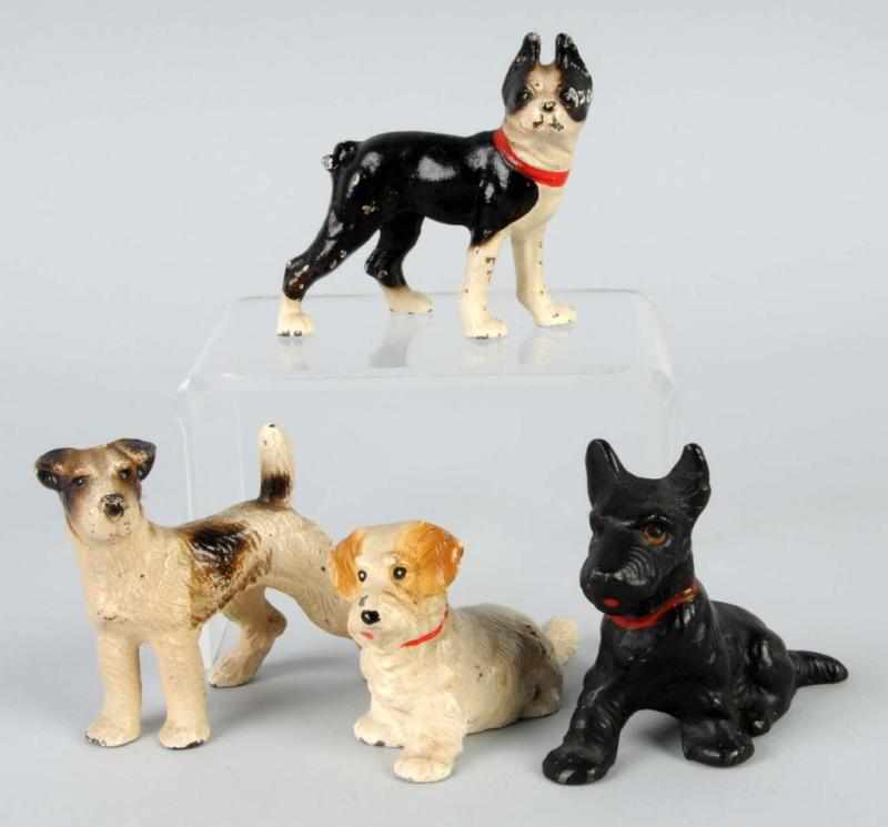 Appraisal: Lot of Cast Iron Dog Paperweights Description Assorted Hubley dogs