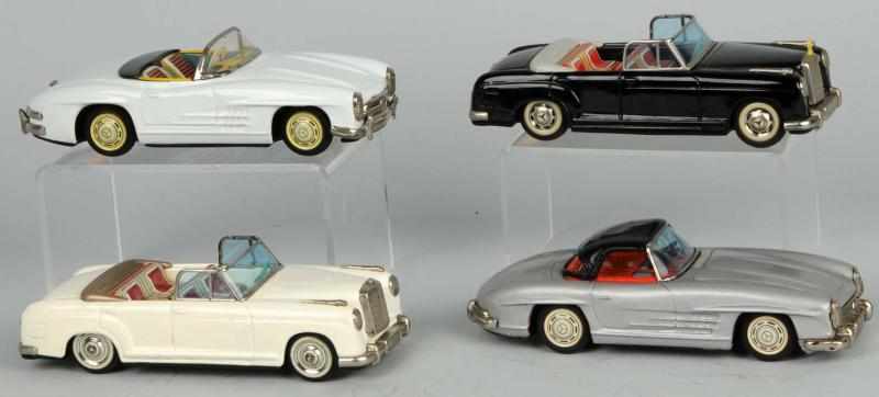 Appraisal: Lot of Tin Mercedes Automobile Friction Toys Description Japanese Working