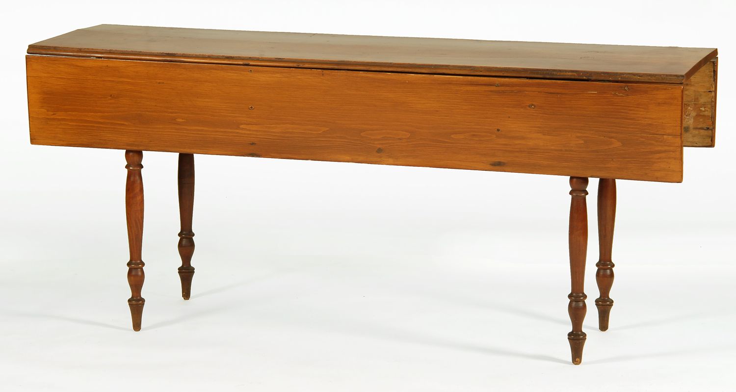 Appraisal: COUNTRY SHERATON DROP-LEAF HARVEST TABLE Circa In pine Simple turned