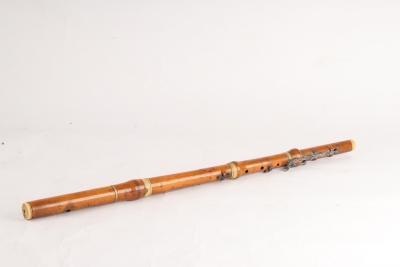 Appraisal: A boxwood six-key ivory flute by Potter Johnson's Court Fleet