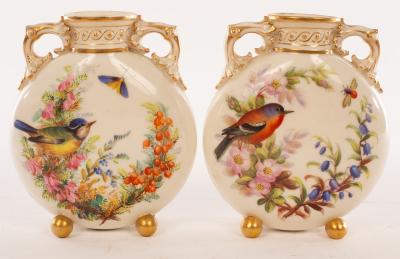 Appraisal: A pair of Royal Worcester pilgrim flasks each with gilt