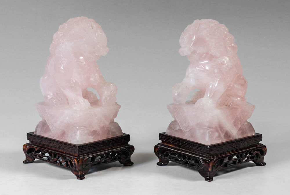 Appraisal: PAIR CHINESE CARVED ROSE QUARTZ FOO LIONS Each measures ''