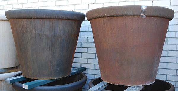 Appraisal: A SUBSTANTIAL PAIR OF RUST PATINATED COMPOSITE GARDEN POTS each