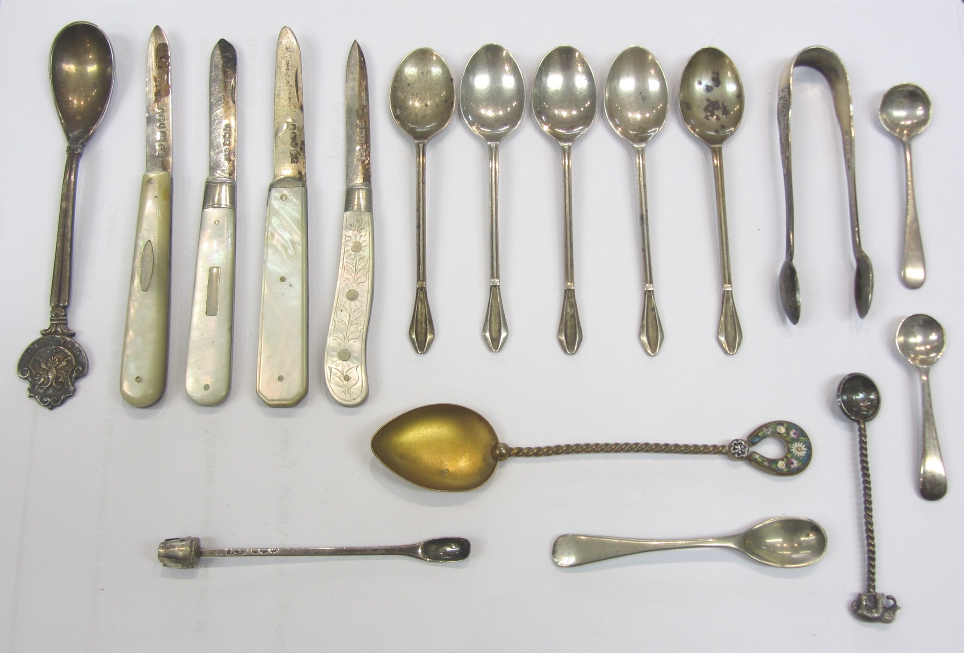 Appraisal: A George III silver caddy spoon with a decorated handle