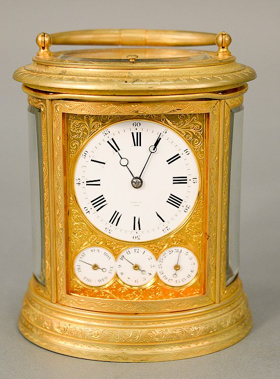 Appraisal: Oval Tiffany Co carriage clock white enameled dial marked Tiffany