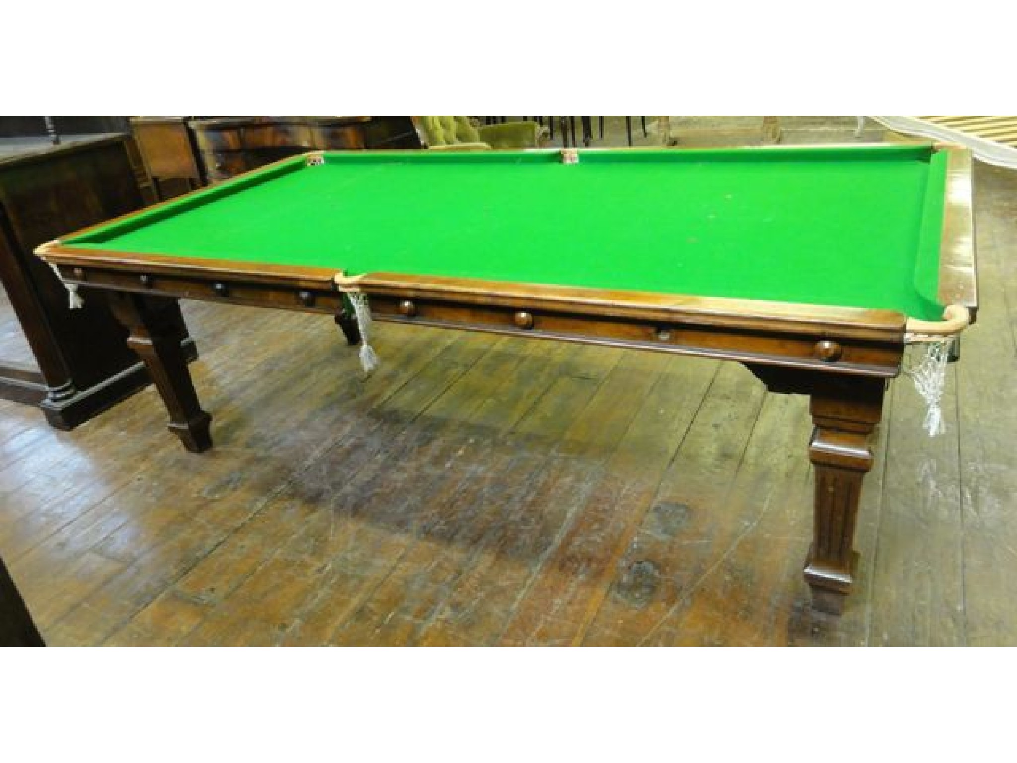 Appraisal: A threequarter size E J Riley Acrington walnut framed snooker