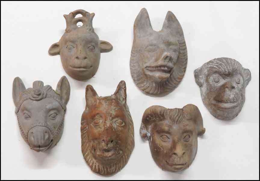 Appraisal: SIX CLAY MASKS Comprised of two wolves monkey ram goat