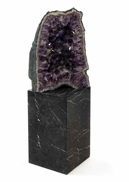 Appraisal: A Geode Specimen of typical naturalistic form set on a