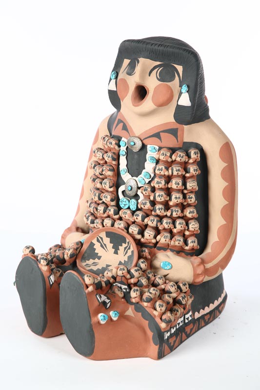 Appraisal: JEMEZ STORY TELLER BY CAROLINE SANDO B Pottery figure with