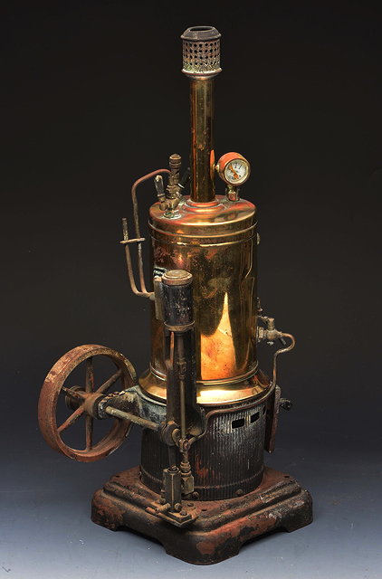 Appraisal: A GERMAN WURTEMBREG STEAM ENGINE with cylindrical brass body and