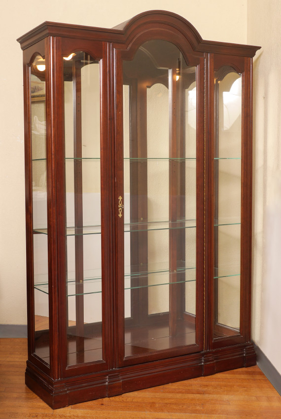 Appraisal: JASPER LIGHTED DISPLAY CABINET Arched center door glass panels either