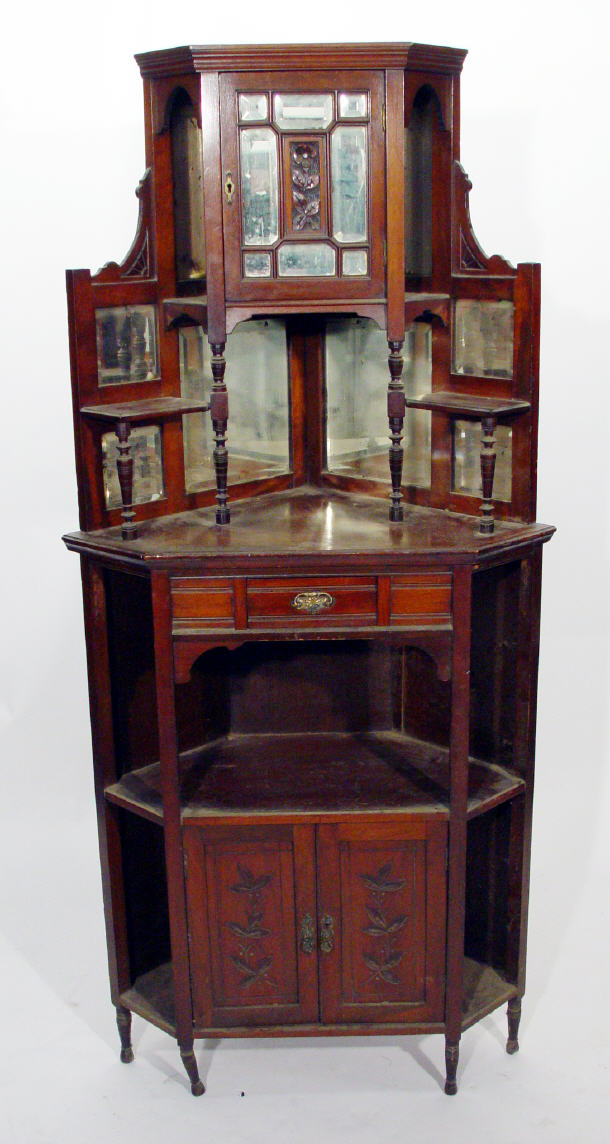 Appraisal: Victorian aesthetic walnut corner cabinet with mirrored door and shelf