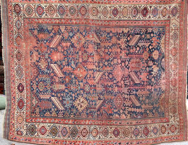 Appraisal: Antique Caucasian rug x Areas of loss in center and