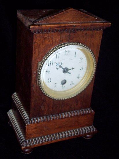 Appraisal: An Edwardian mantel clock in a mahogany architectural case the