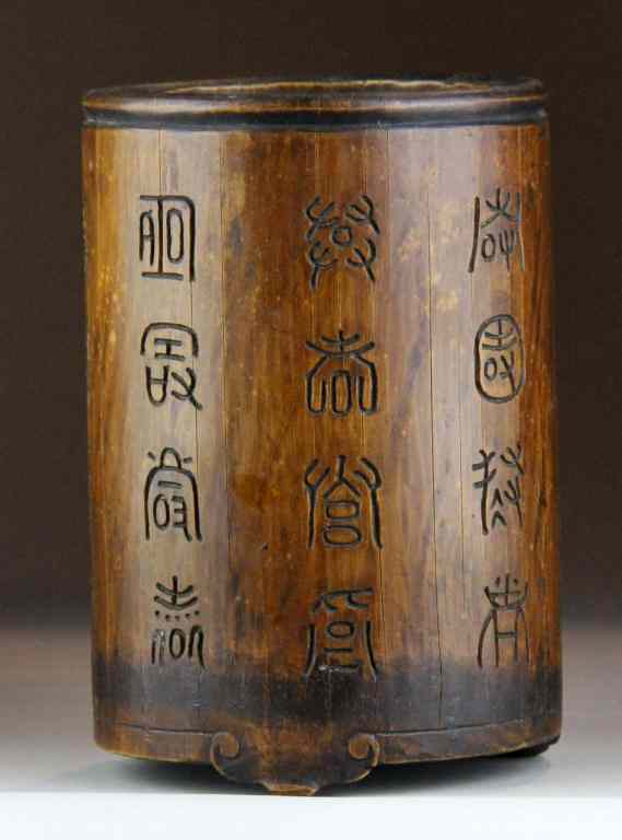 Appraisal: Chinese Qing Carved Hardwood Brush PotThe body carved with calligraphy