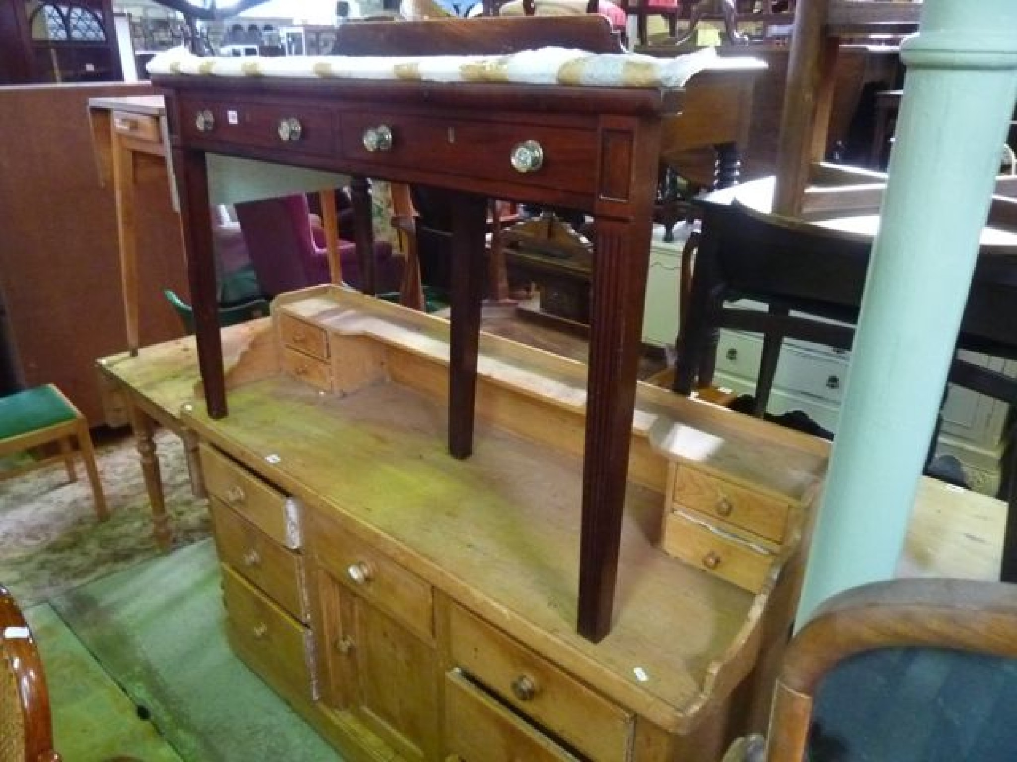 Appraisal: A mahogany hall side table with two dummy frieze drawers