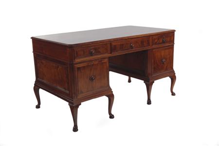 Appraisal: A walnut twin pedestal desk By Howard Sons Ltd circa