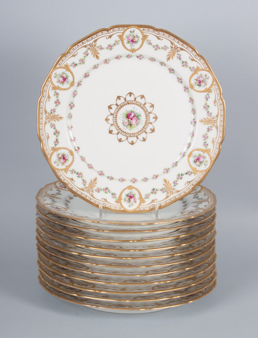 Appraisal: Limoges porcelain dinner plates early th century floral and gilt