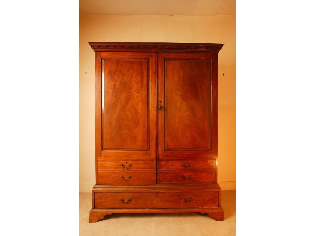 Appraisal: AN EARLY GEORGE III MAHOGANY GENTLEMAN'S LINEN PRESS with a