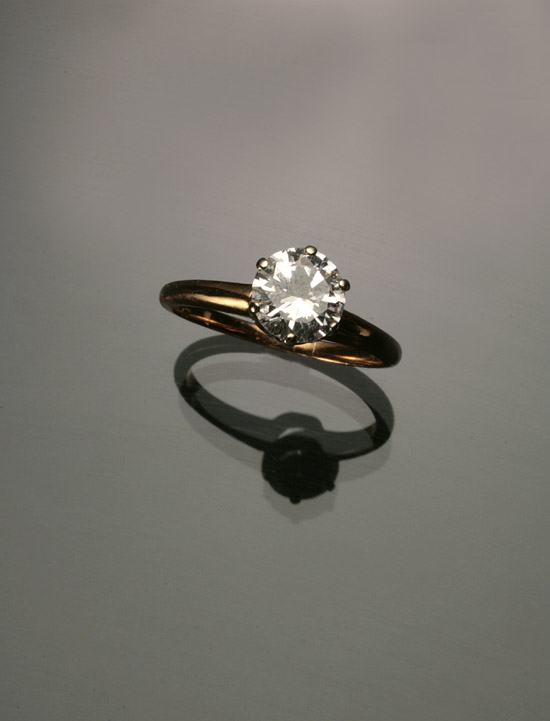 Appraisal: -Karat Yellow-Gold and White-Gold Solitaire Diamond Ring The six-prong mount