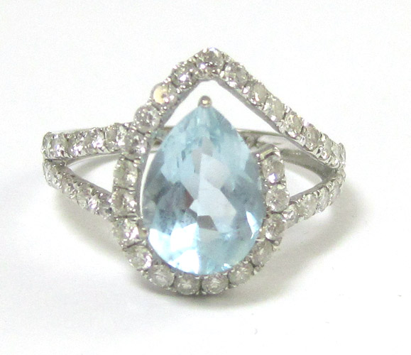 Appraisal: AQUAMARINE DIAMOND AND FOURTEEN KARAT WHITE GOLD RING featuring a