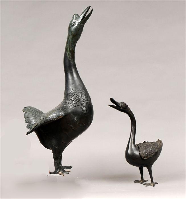 Appraisal: Two Japanese Patinated Metal Figures of Geese to in Provenance