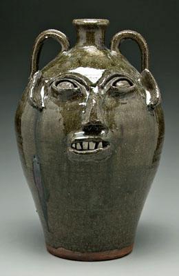 Appraisal: B B Craig two-handled face jug bulging eyes broken china