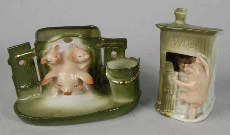 Appraisal: Lot of German Porcelain Pig Novelties Description Three pigs in