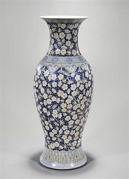 Appraisal: Tall Chinese enameled porcelain vase blue and white floral design