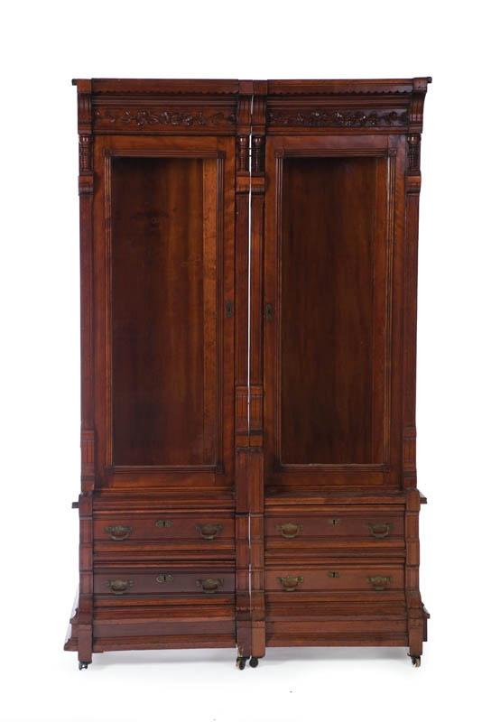 Appraisal: TWO PART VICTORIAN BOOKCASE Matching walnut bookcases having a dentil