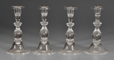 Appraisal: Set of four Steuben candlesticks clear glass baluster form teardrop