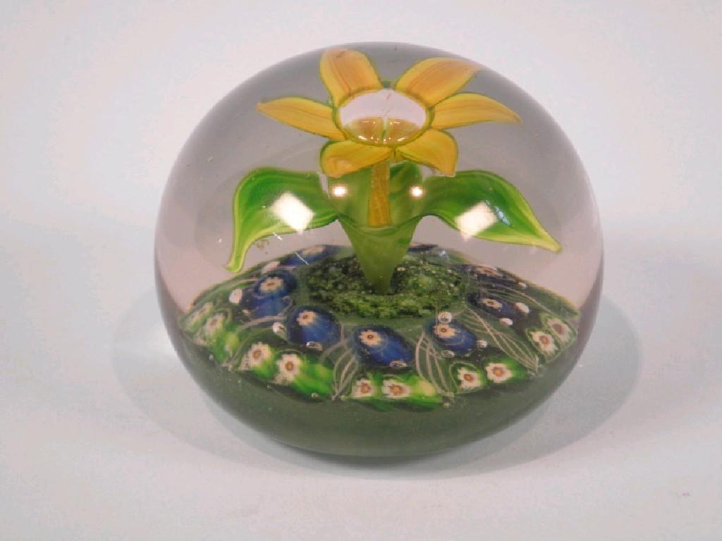 Appraisal: A Millefiori glass paper weight with a central flower cm