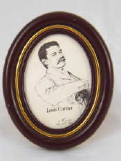 Appraisal: A Cartier oval photo frame with strut back and dark