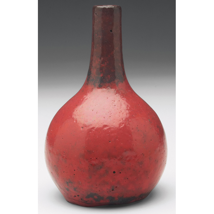 Appraisal: Chelsea Keramic vase bulbous shape covered in an ox blood