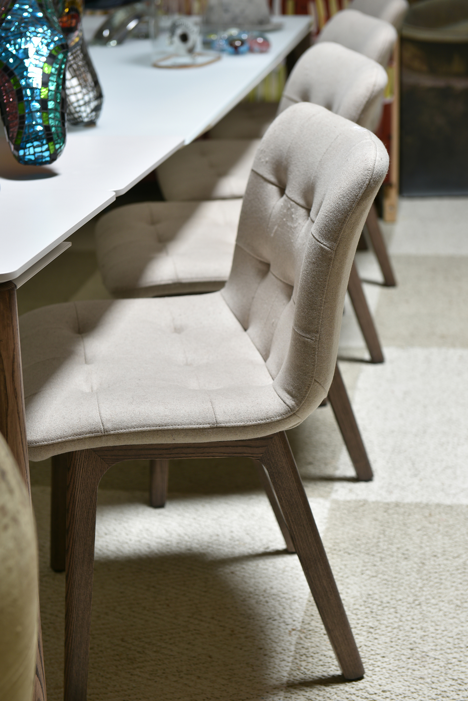 Appraisal: A SET OF FOUR CONTEMPORARY DINING CHAIRS IN WOOLEN UPHOLSTERY