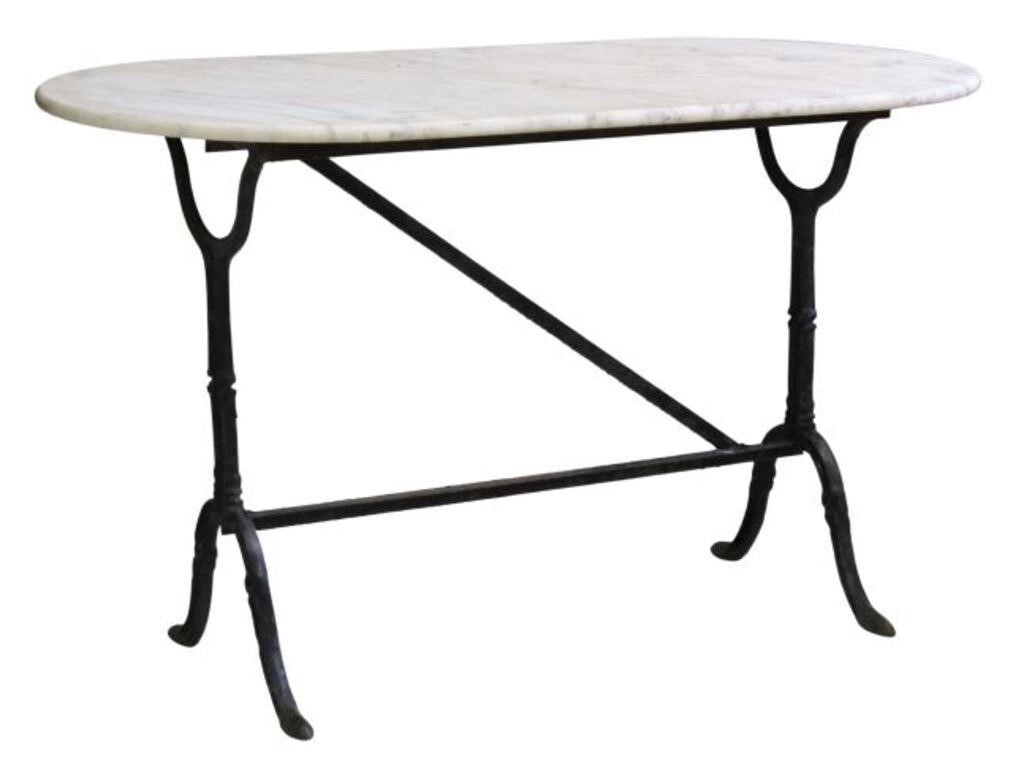 Appraisal: French marble-top cast iron bistro table oval marble top over