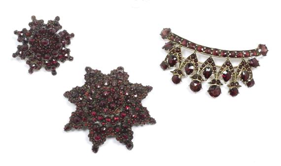 Appraisal: LOT OF GARNET BROOCHES circa Tombac Two matching star shape