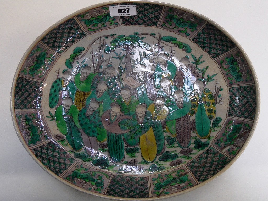 Appraisal: Japanese dish decorated in greens and yellow with scholars def