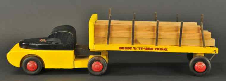 Appraisal: BUDDY 'L' WOODEN LUMBER TRACTOR TRAILER c 's deluxe timber