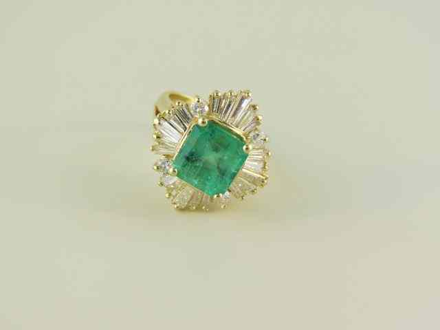 Appraisal: Emerald Diamond Ring carat emerald cut gem surrounded by diamonds