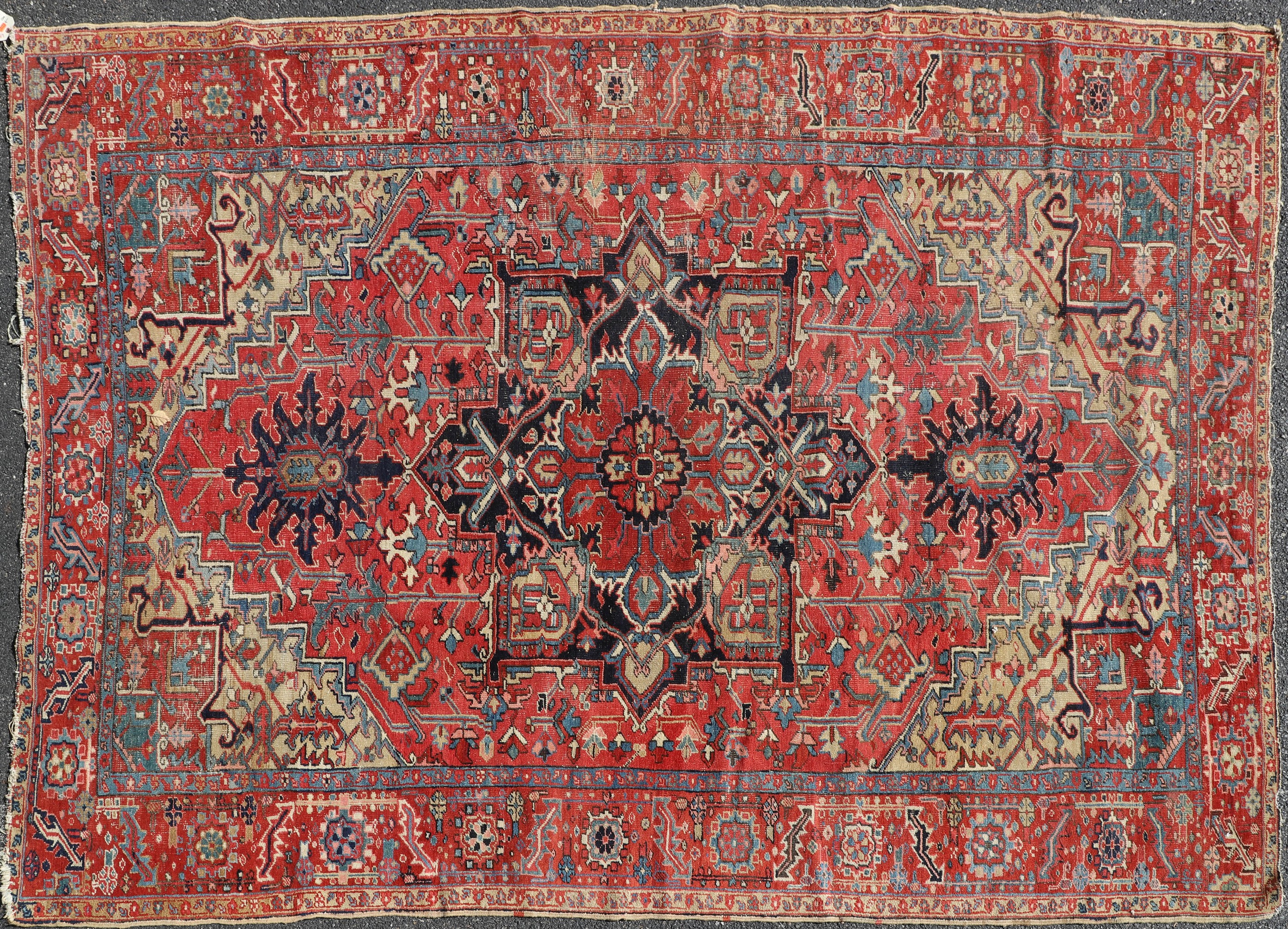 Appraisal: ' X ' Antique Persian Heriz Rug fading wear torn