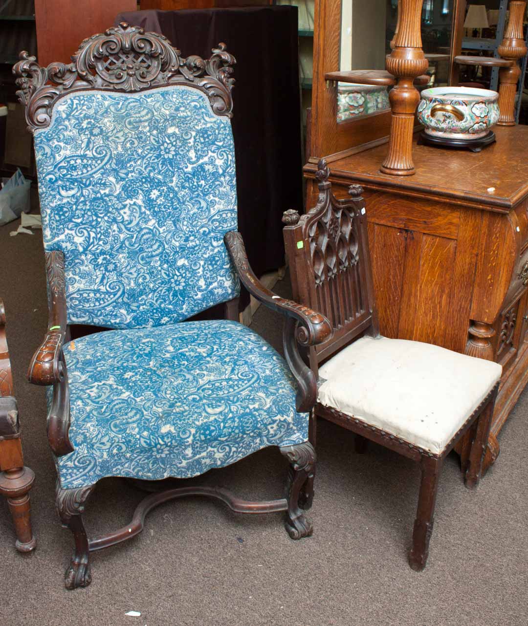 Appraisal: Two chairs Gothic style hall chair and a heavily carved