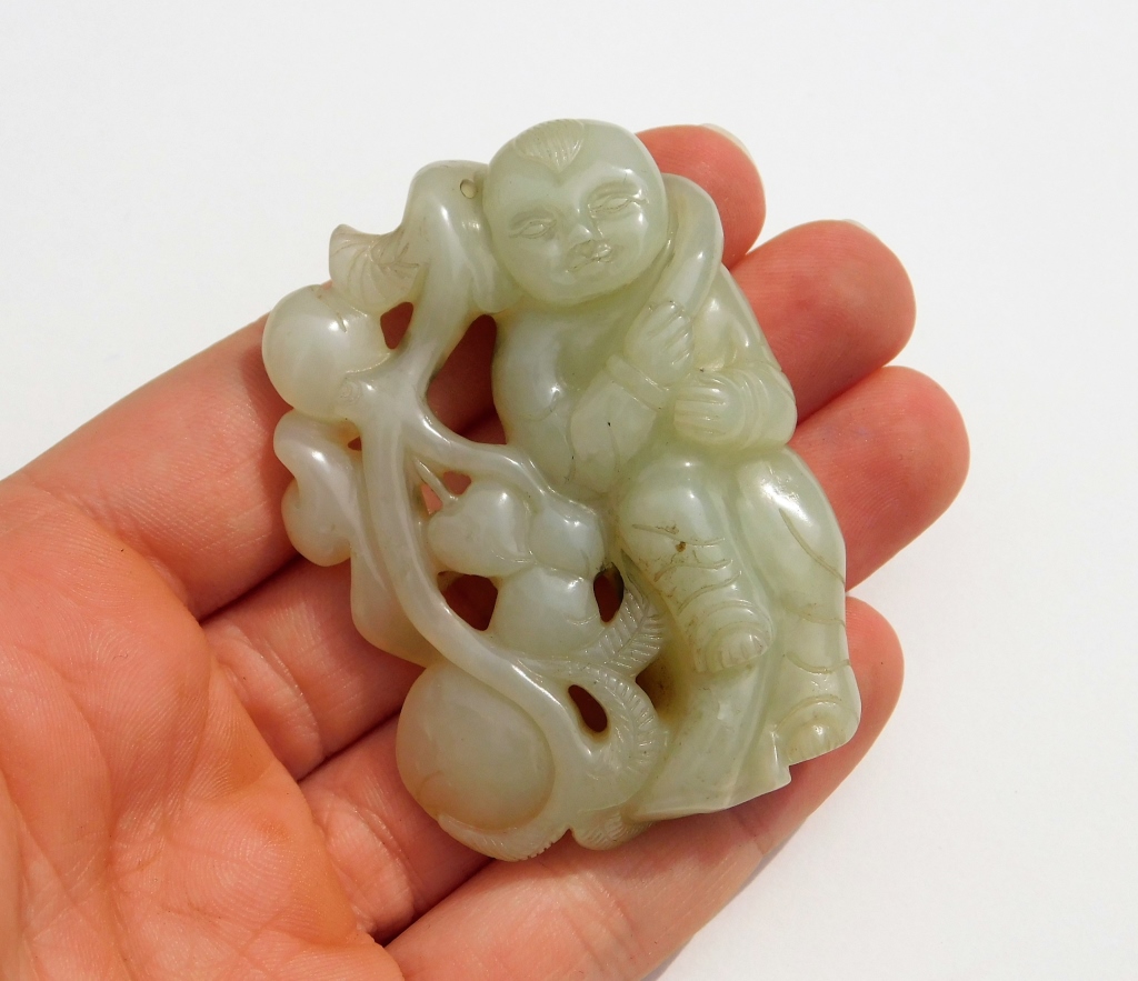 Appraisal: CHINESE QING DYNASTY CARVED JADE PENDANT China Qing DynastyDepicts the