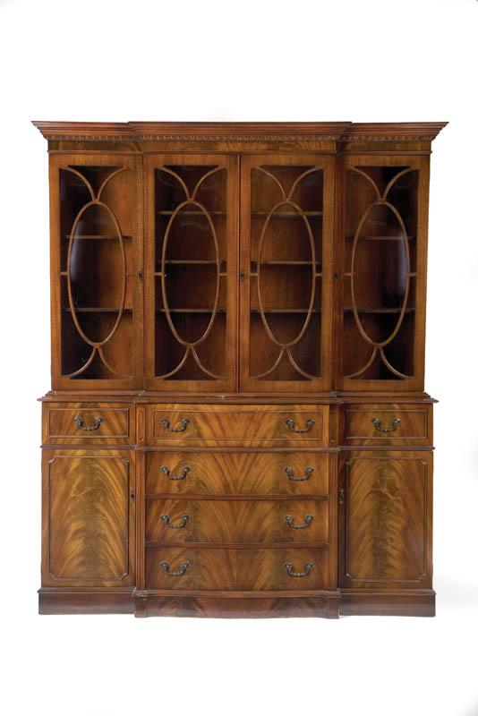 Appraisal: CHIPPENDALE-STYLE BREAKFRONT Twentieth century mixed wood Two-piece top section with