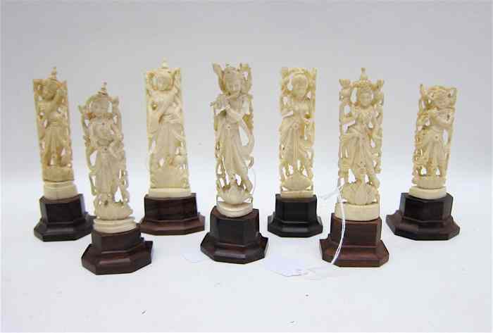 Appraisal: SEVEN EAST INDIAN HAND CARVED IVORY FIGURES of woman in