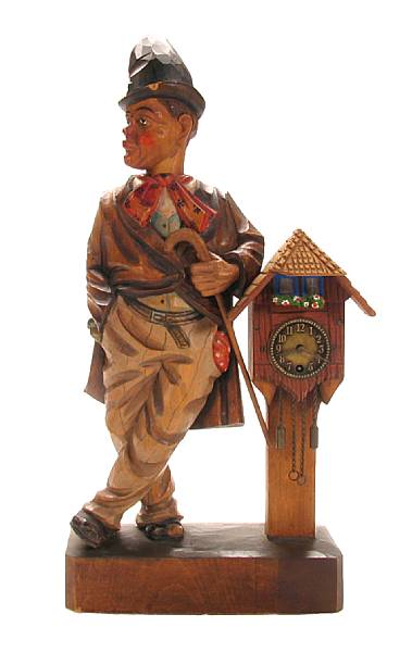 Appraisal: A Continental paint decorated carved wood automaton clock height in