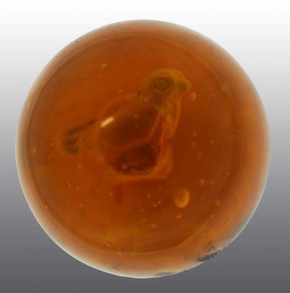 Appraisal: Sulphide Amber Bird Marble Description Polished surface Bird is well