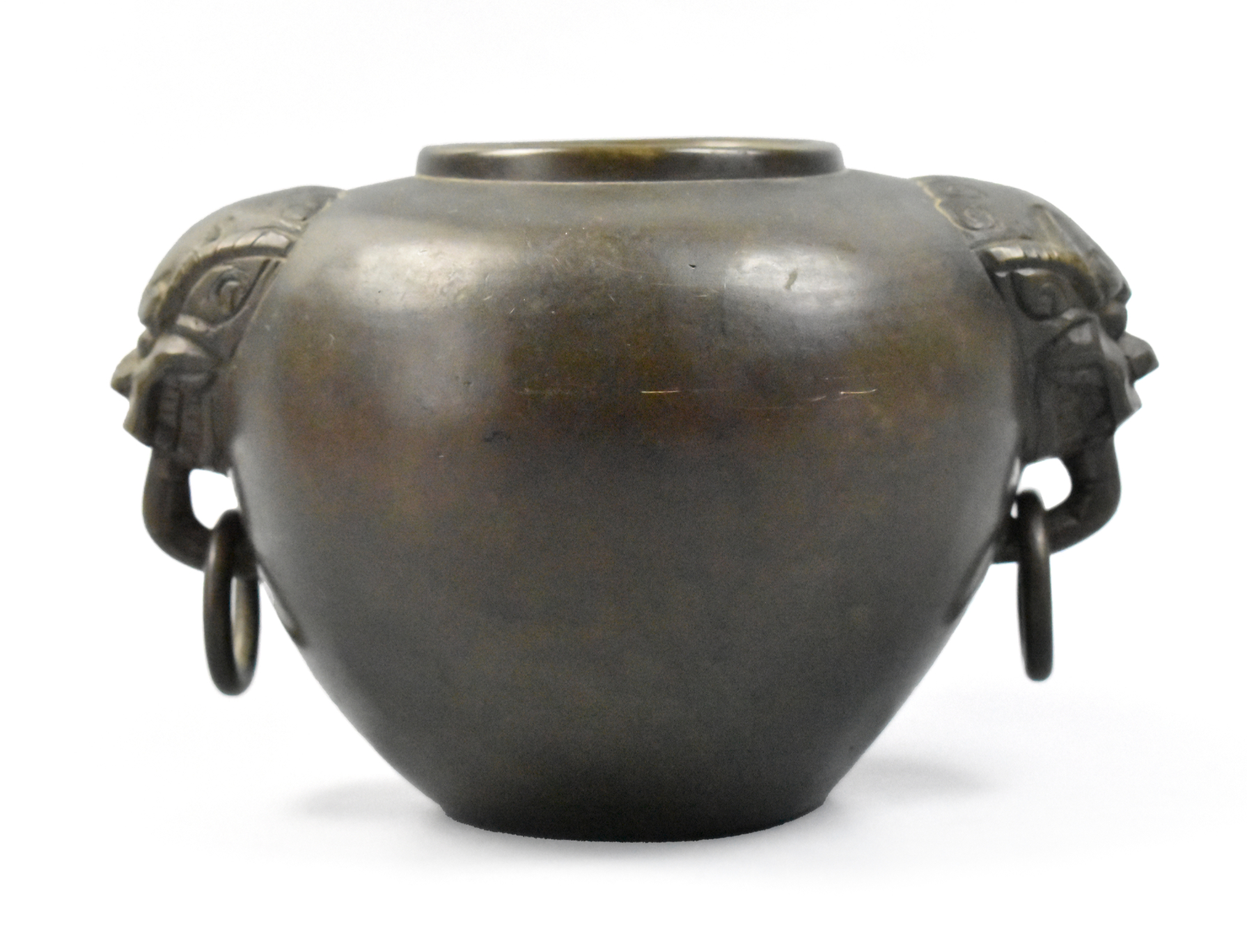 Appraisal: A large Chinese cast bronze water coupe with beast handles