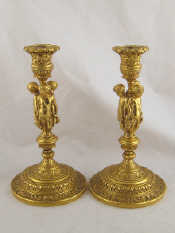 Appraisal: A fine pair of gilt metal probably bronze candlesticks the